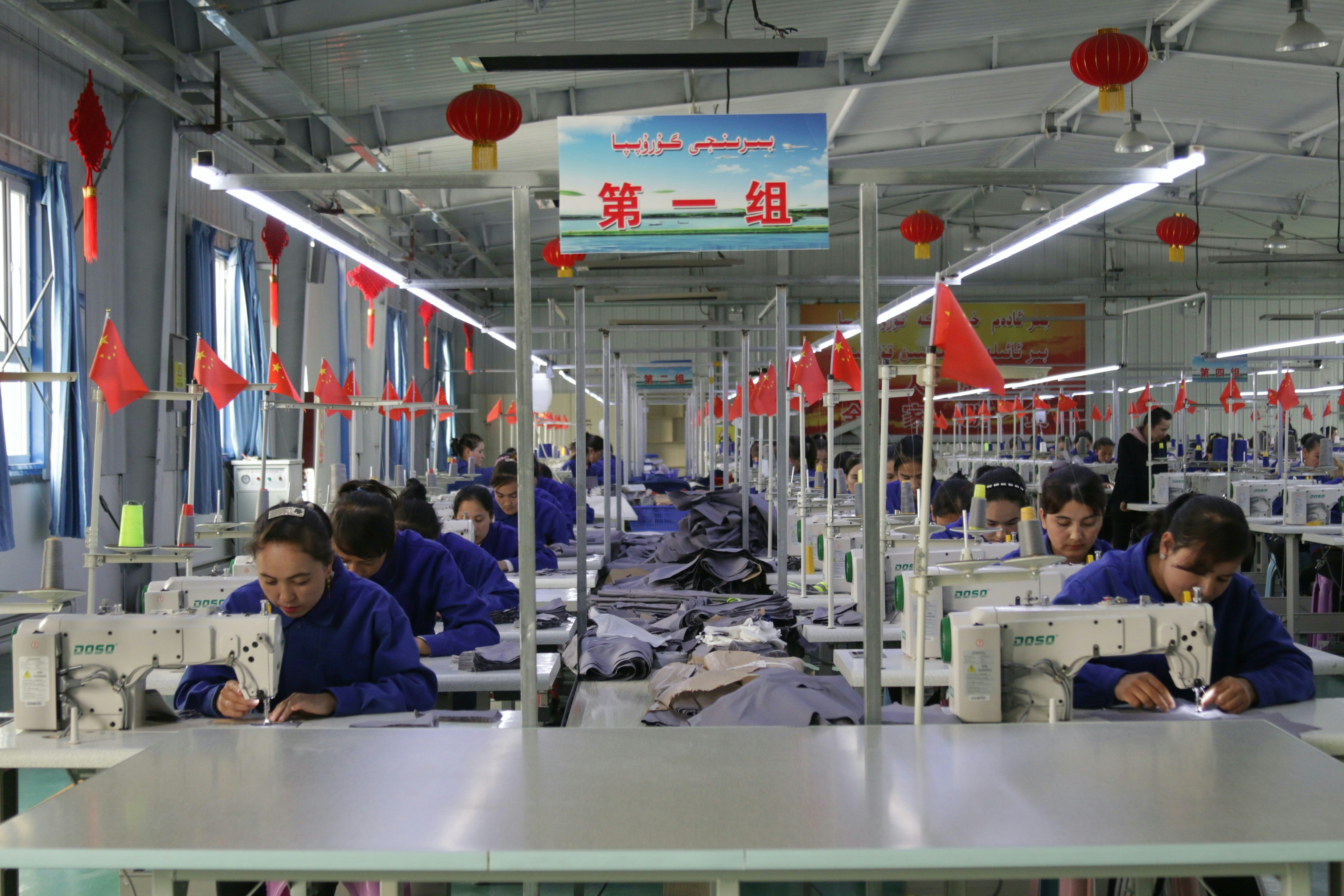 Workers in a factory in Hotan county, Xinjiang, China. Shutterstock.
