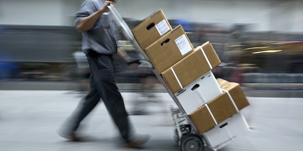 Holiday Retail Workers Seek ‘Temporary Lifeline’ in Warehouse Jobs
