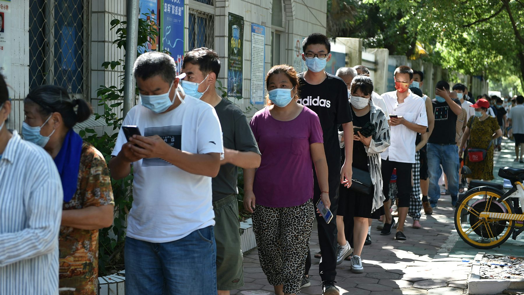 Residents line up for the sixth round of Covid-19 tests since late July in Nanjing. Getty Images.