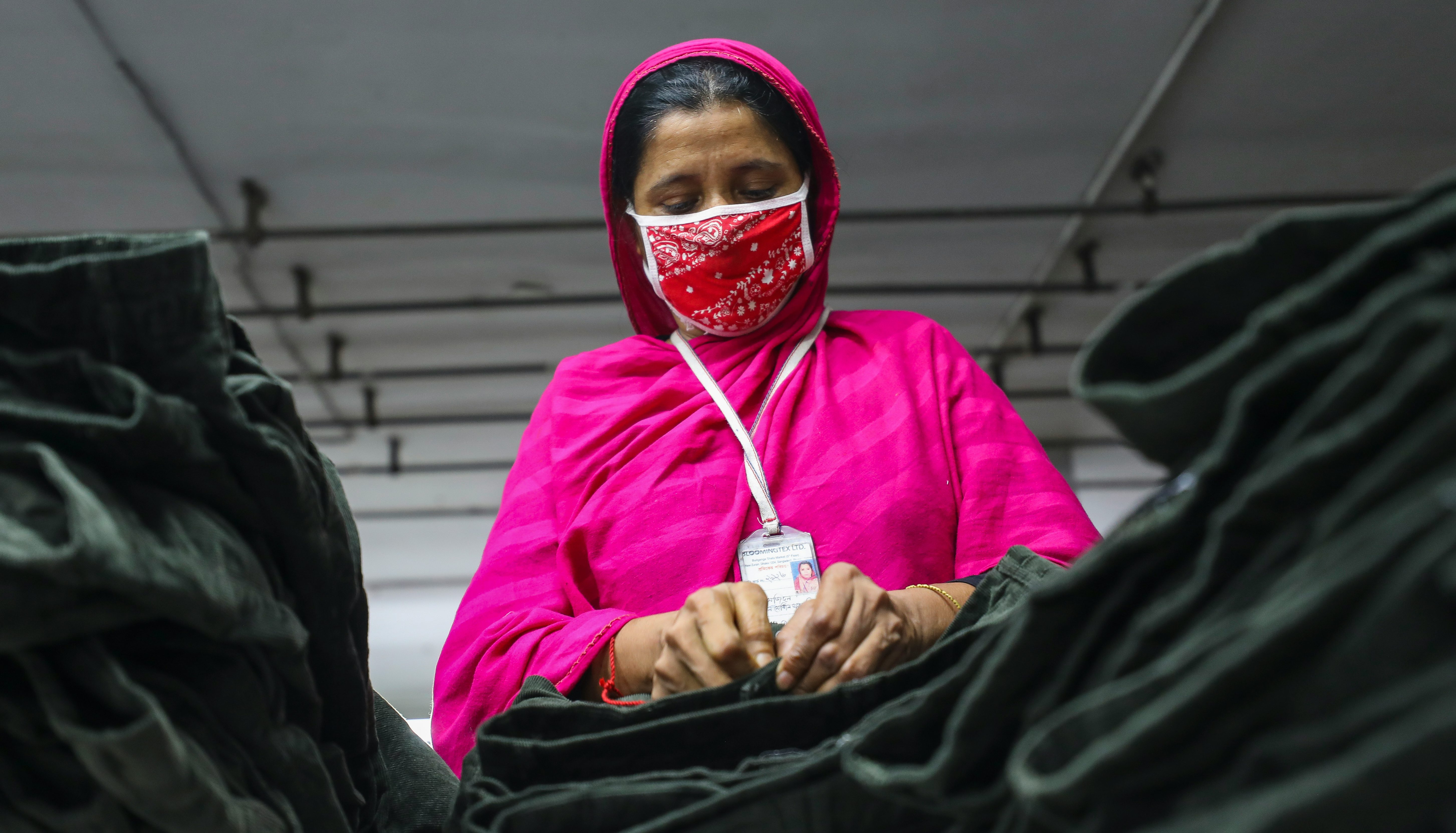 A garment worker in Dhaka, Bangladesh. Getty Images.