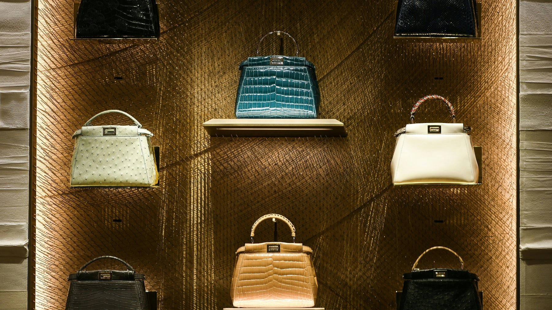 Fendi leather purses on display at a store in Paris. Shutterstock.