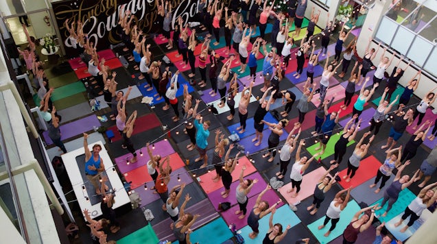 A yoga class at Lululemon's Vancouver headquarters | Source: Courtesy
