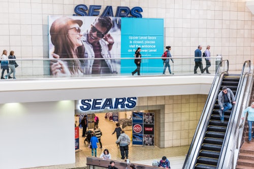 A Sears store displays its closure sign