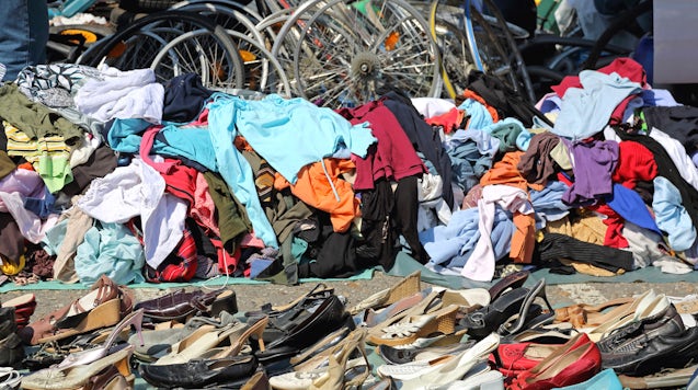 Clothing at a flea market | Source: Shutterstock