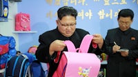 North Korean leader Kim Jong-Un inspecting a Pyongyang bag factory | Source:  Getty